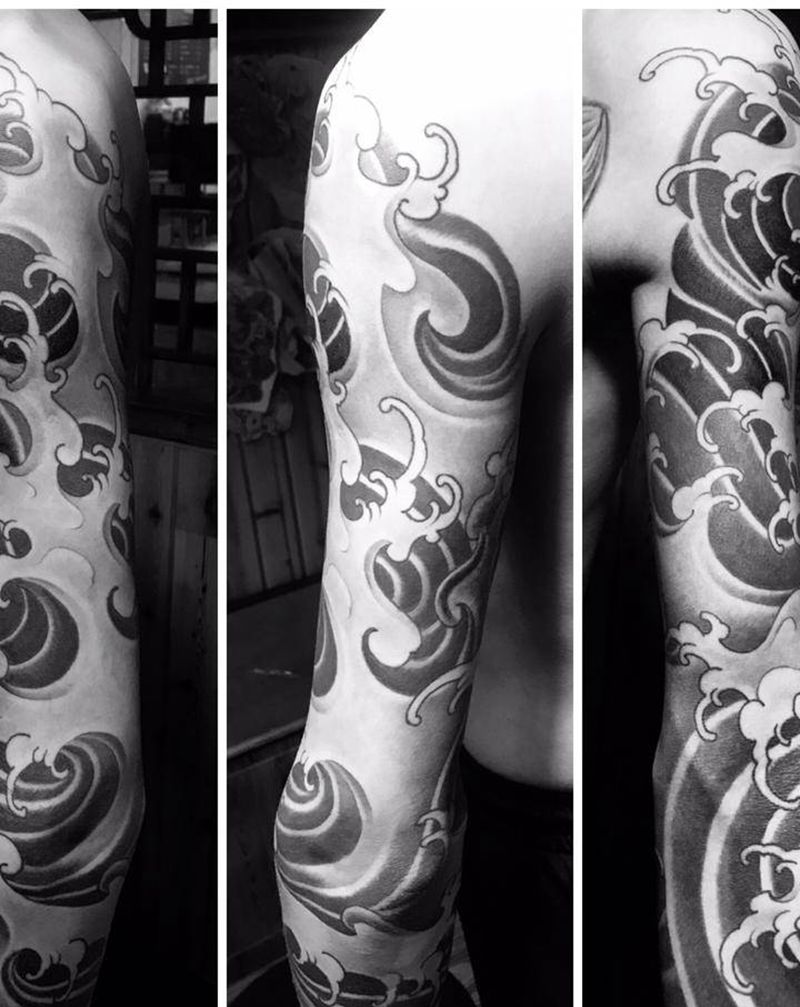 浪臂纹身图片_手臂新传统纹身图案