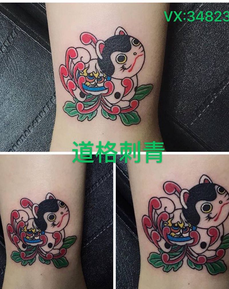 猫猫纹身图片_腿部老传统纹身图案