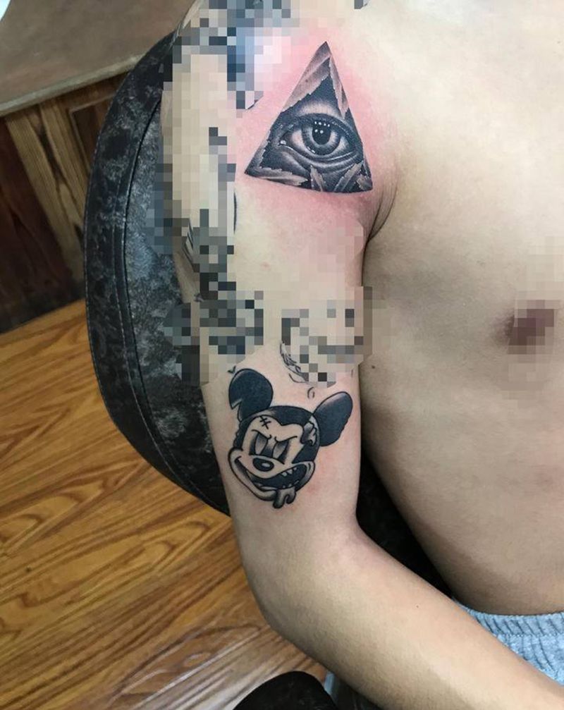 三角眼纹身图片_手臂Old School欧美写实纹身图案