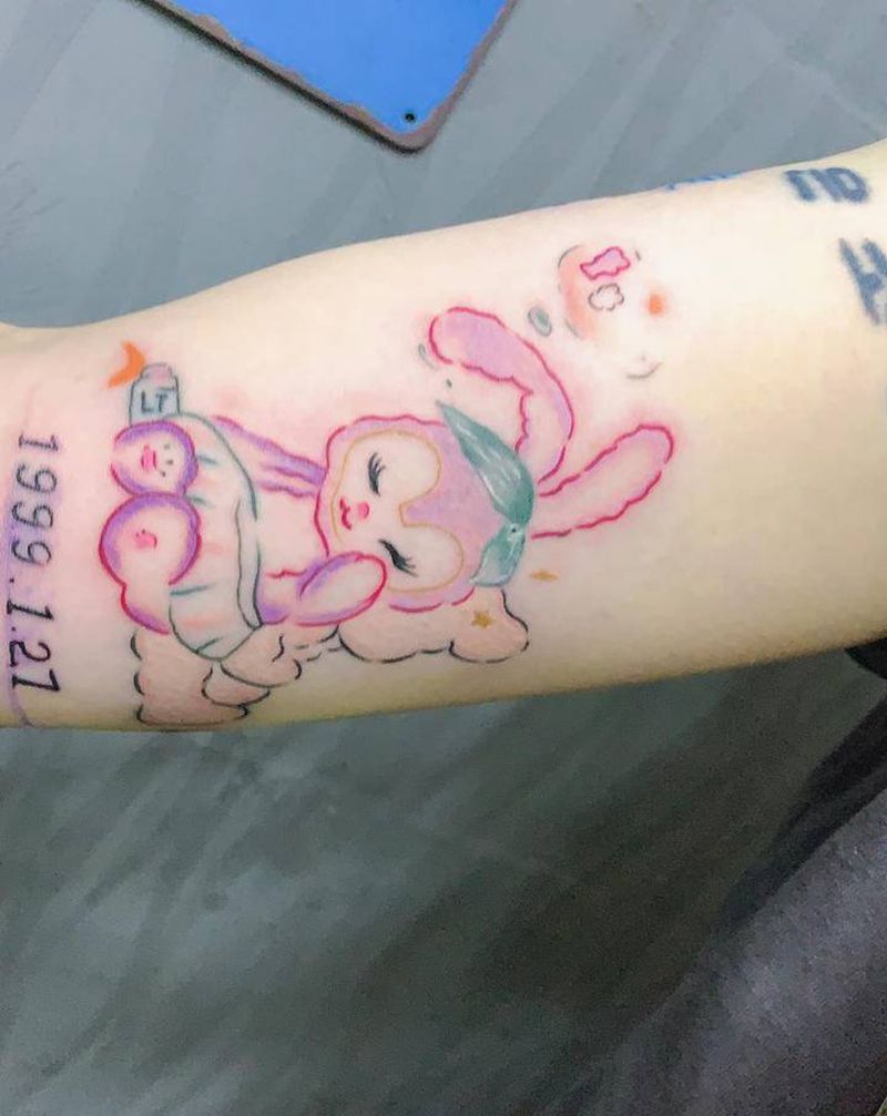 啥也不知道纹身图片_手臂New School纹身图案