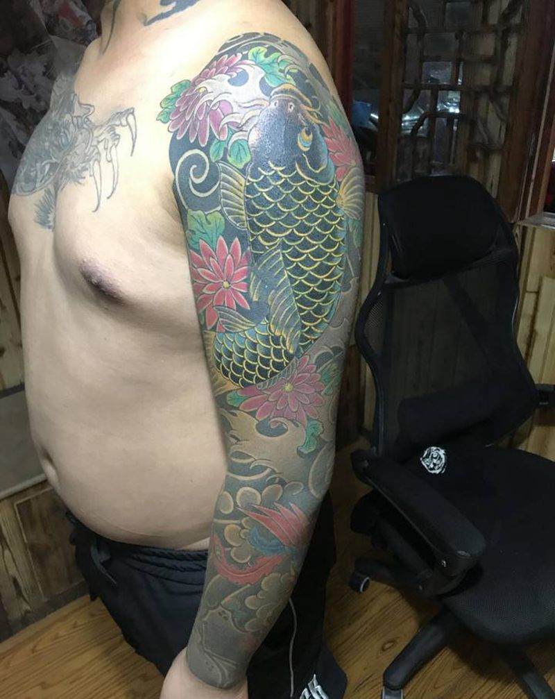 遮盖作品纹身图片_手臂老传统纹身图案