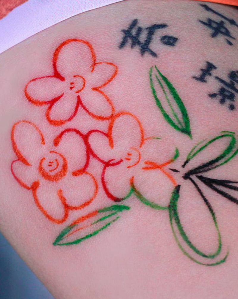 可爱系微笑花朵纹身图片_手臂水彩花笑脸小清新纹身图案