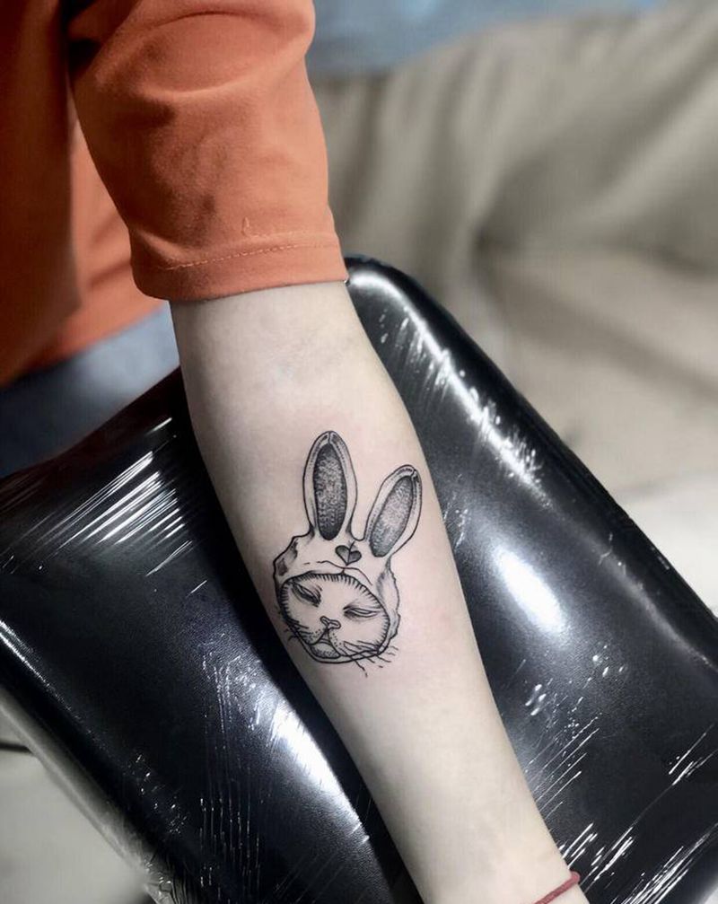 飞针兔子纹身图片_手臂点刺纹身图案