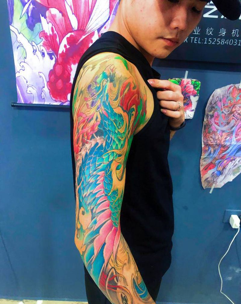 重彩花臂凤凰纹身图片_手臂新传统凤凰纹身图案