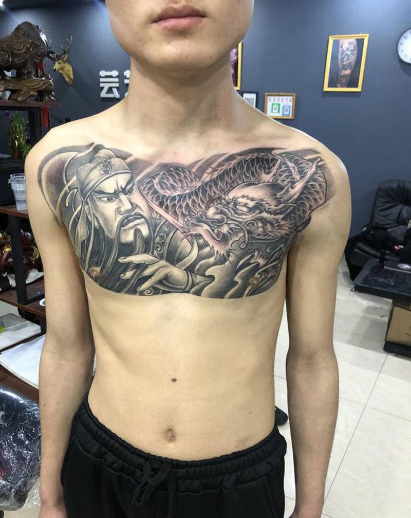 花胸完成纹身图片_胸部新传统关公 龙龙纹身图案
