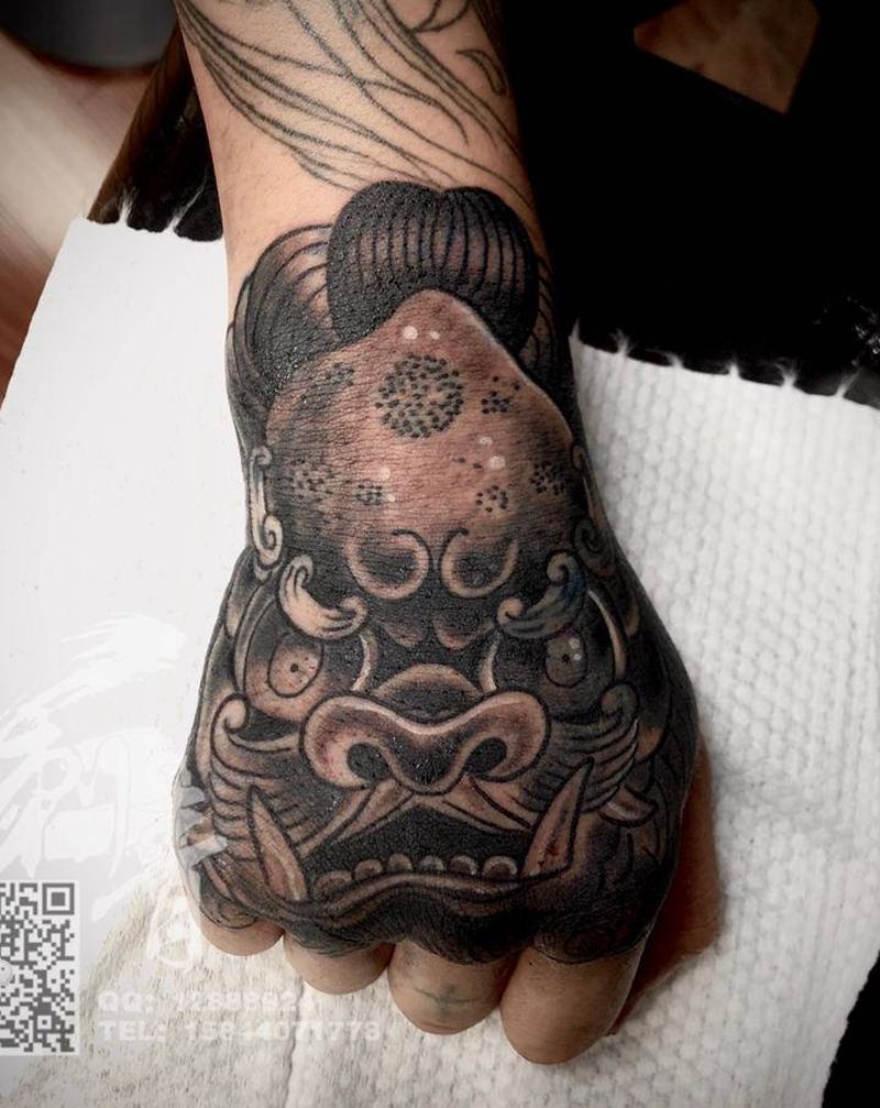 唐狮遮盖纹身图片_手部新传统纹身图案