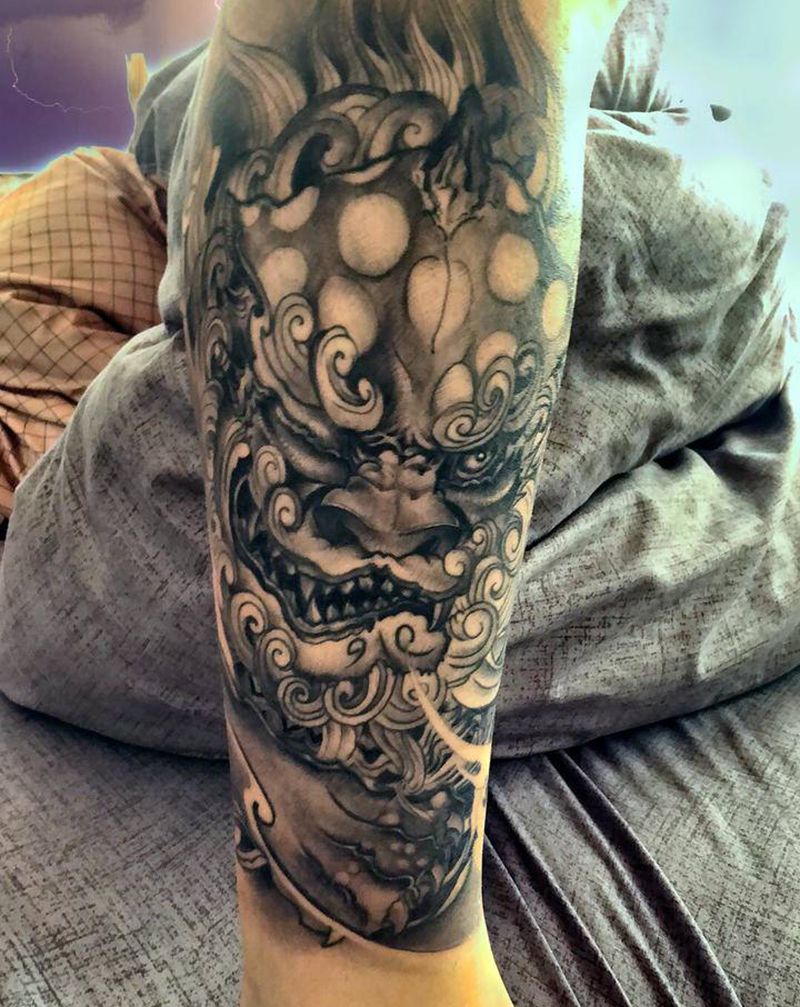 唐狮纹身图片_腿部新传统纹身图案