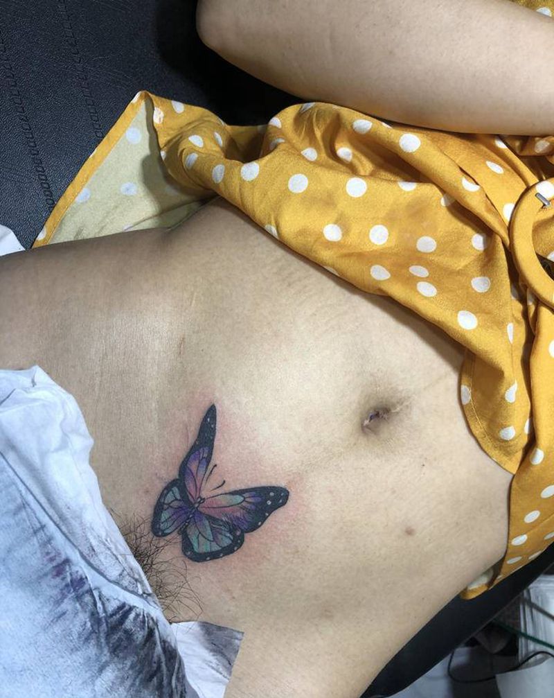 蝴蝶纹身图片_腹部水彩蝴蝶纹身图案