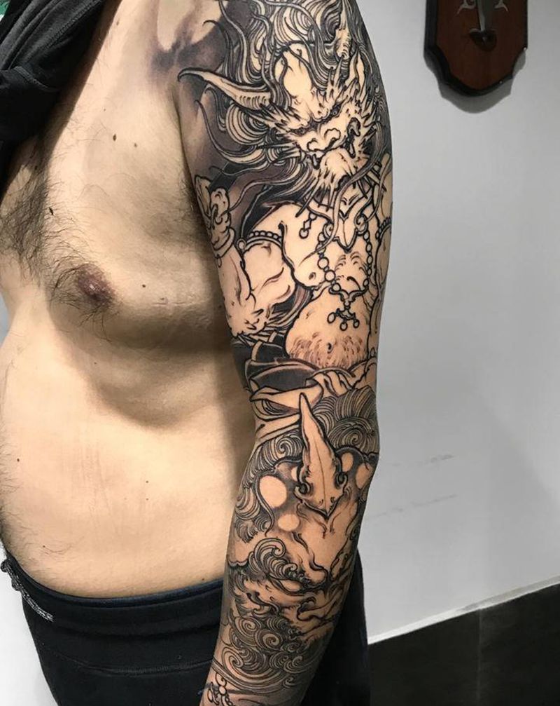 夜叉伏狮纹身图片_手臂新传统夜叉雷神鬼神纹身图案