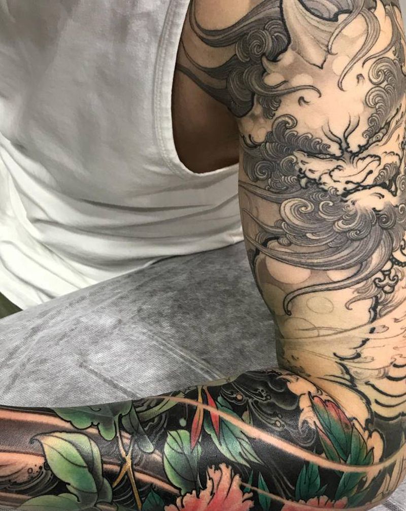 花臂谛听纹身图片_手臂新传统花臂谛听唐狮子纹身图案