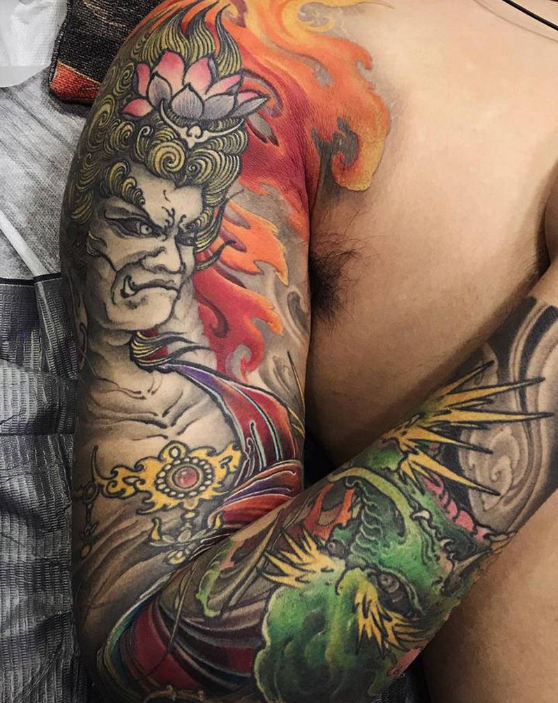 不动明王纹身图片_手臂新传统不动明王龙花臂纹身图案