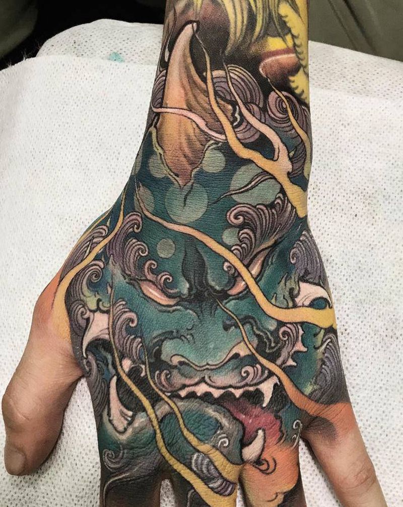 谛听纹身图片_手部新传统谛听唐狮子手背纹身图案