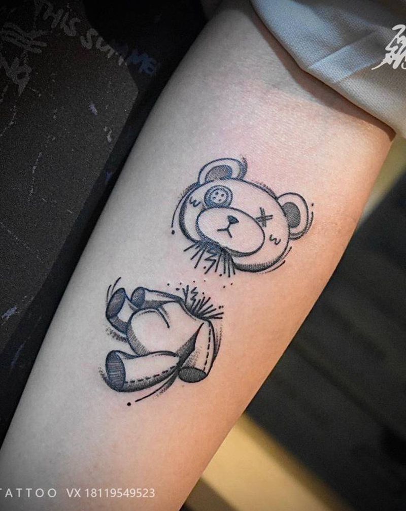 布偶纹身图片_手臂纹身图案