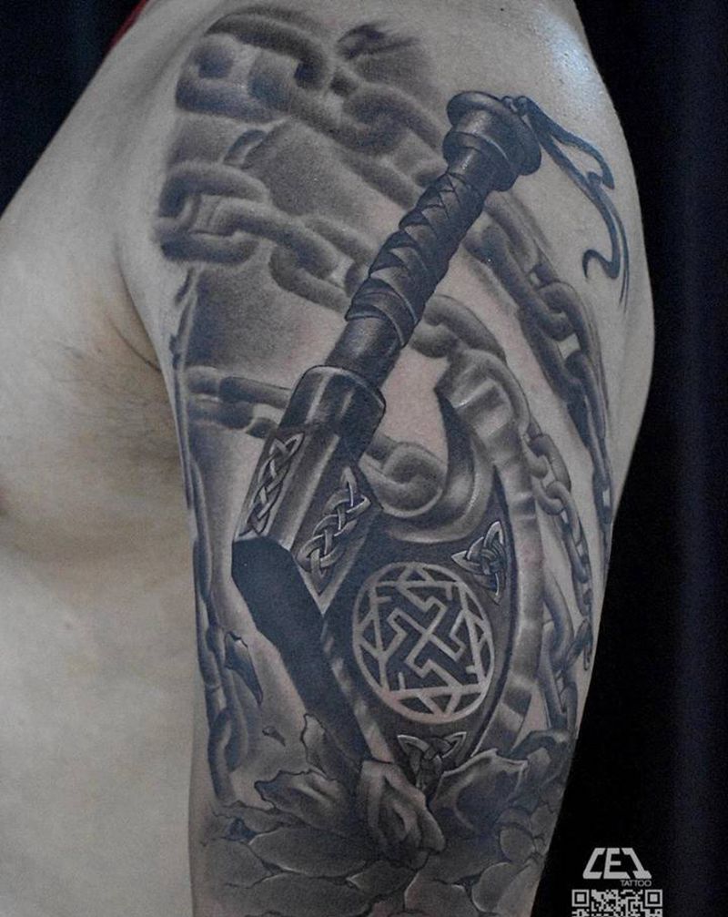 斧头纹身图片_手臂纹身图案
