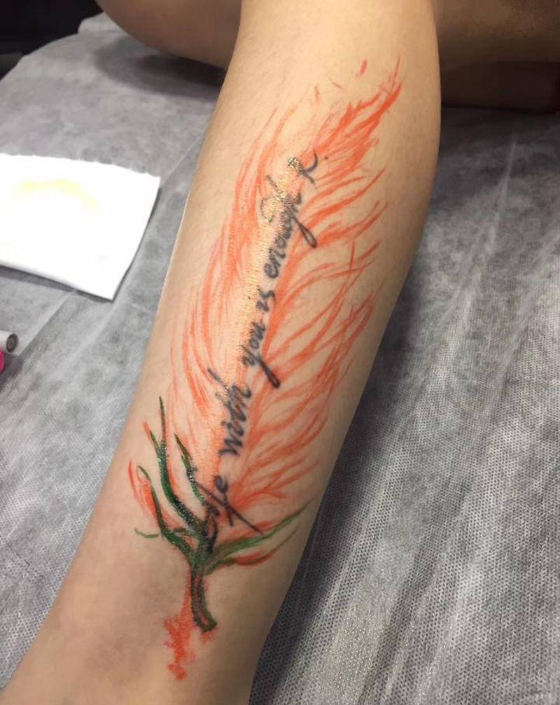 遮盖纹身图片_腿部水彩纹身图案