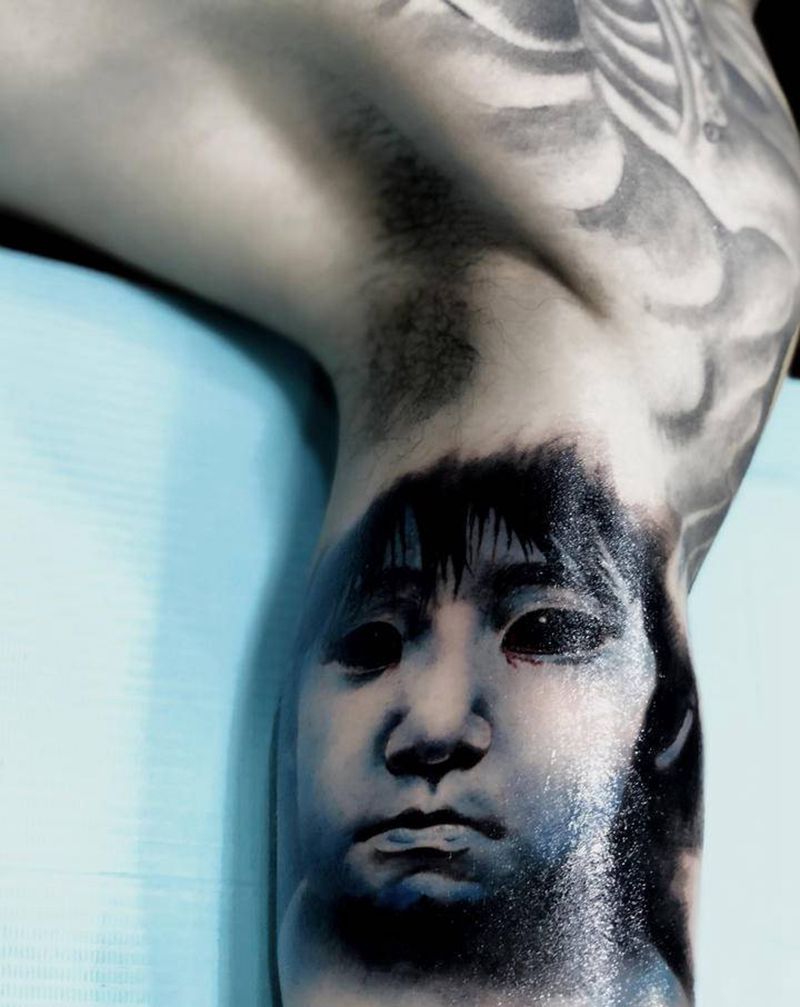 咒怨-佐伯俊雄纹身图片_手臂欧美写实纹身图案