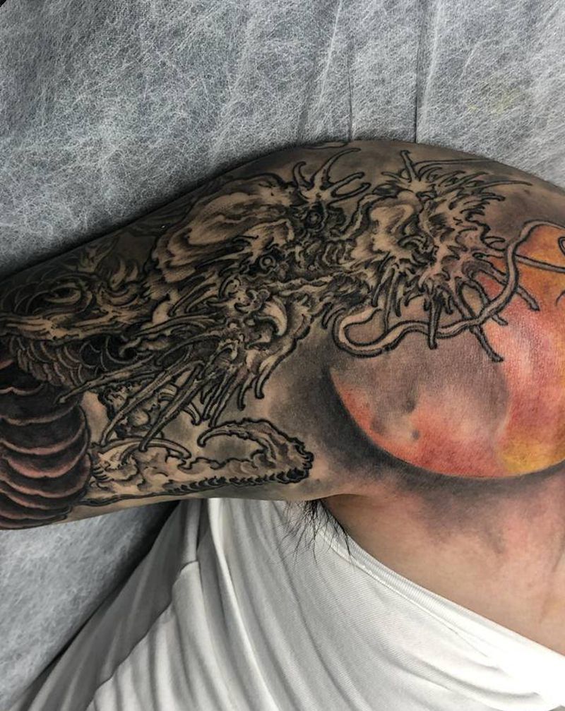 黑灰龙花臂未完成纹身图片_手臂新传统纹身图案