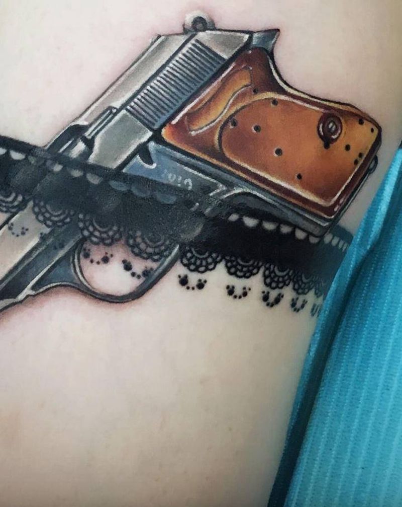 蕾丝手枪纹身图片_腿部水彩纹身图案