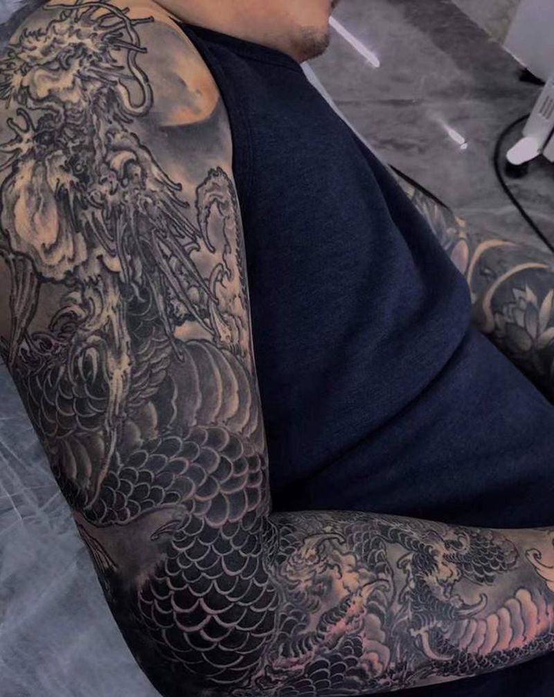 花臂龙纹身图片_手臂手部新传统纹身图案