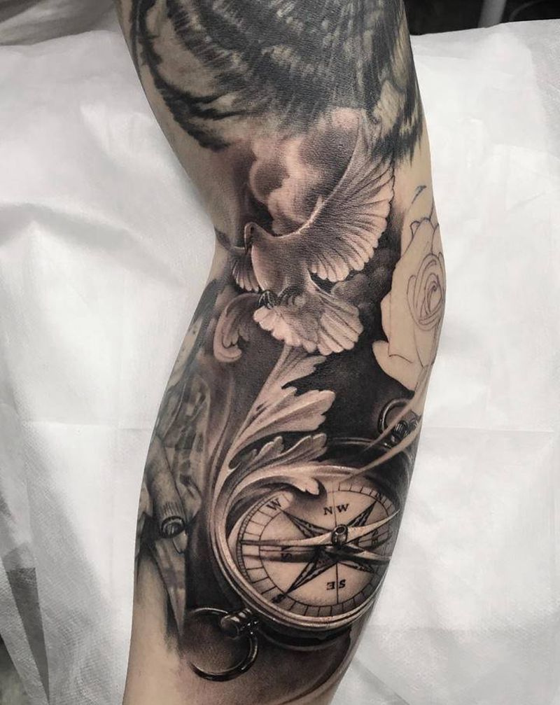 写实花臂 指南针 玫瑰窗 眼睛纹身图片_手臂欧美写实纹身图案