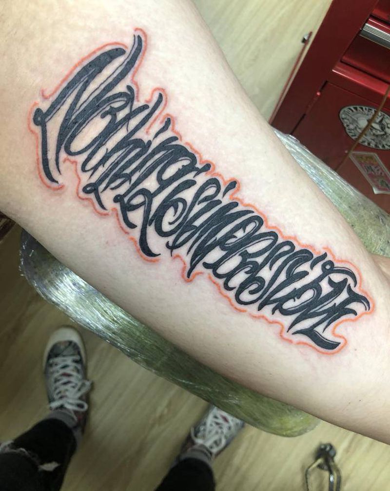 花体字纹身图片_手臂花体字纹身图案