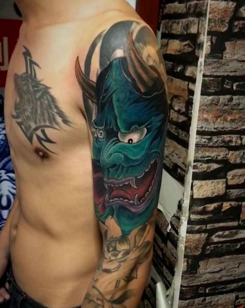 暴力遮盖失败纹身纹身图片_手臂纹身图案