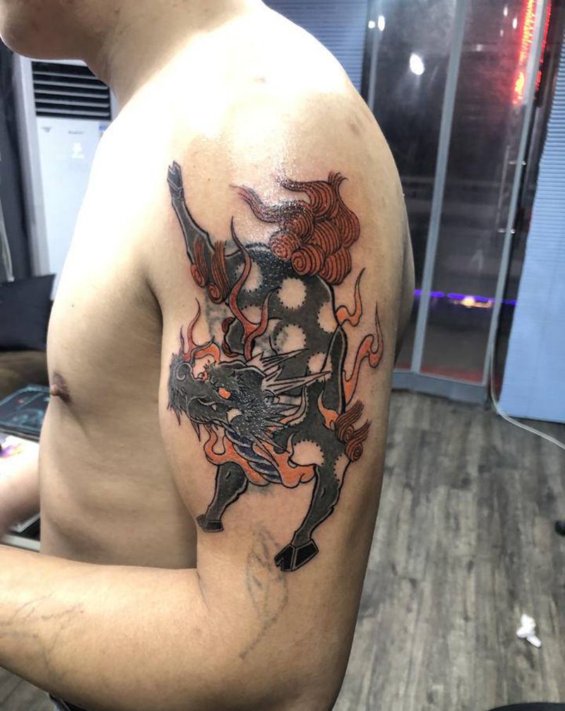 麒麟纹身图片_手臂老传统纹身图案