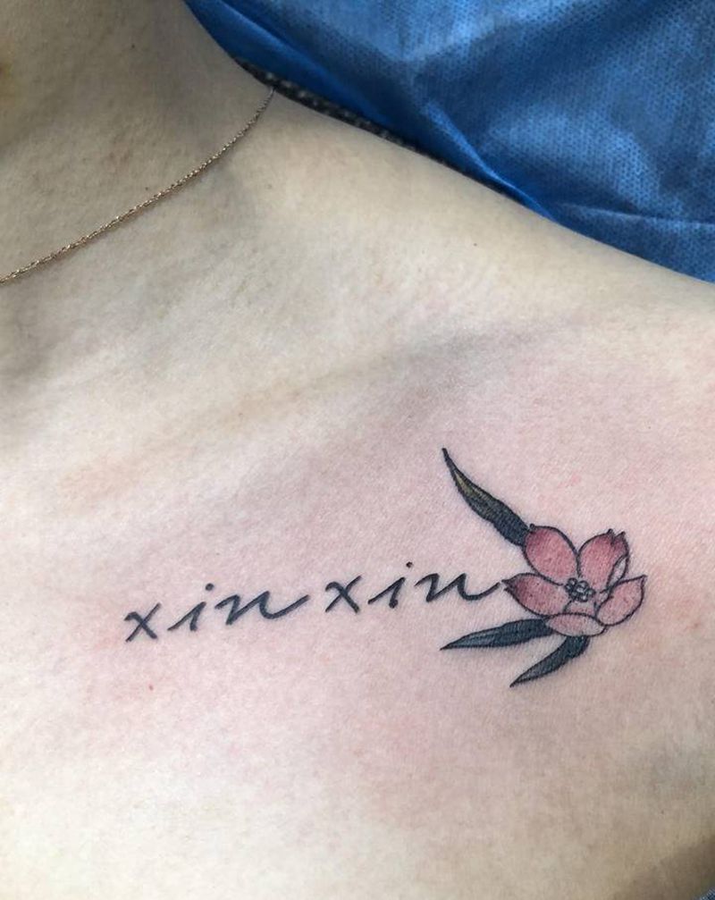 字母樱花纹身图片_胸部纹身图案