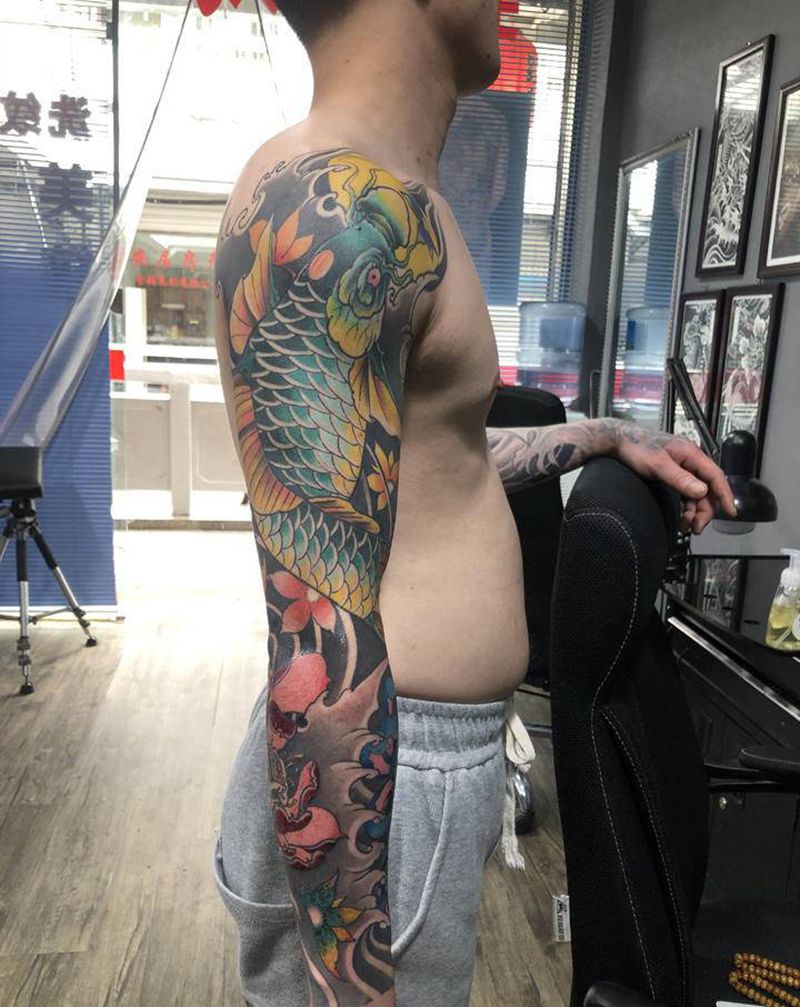 花臂纹身图片_手臂新传统纹身图案