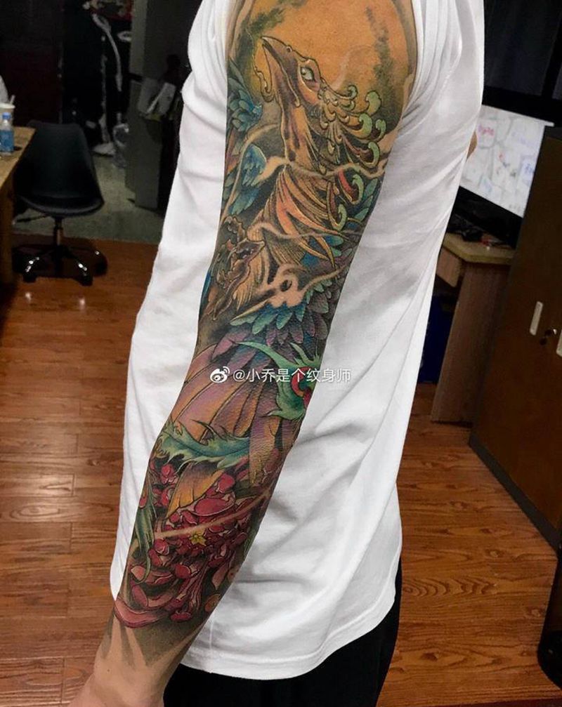 凤凰纹身图片_手臂新传统凤凰纹身图案