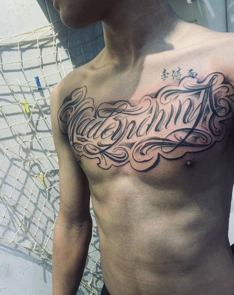 花胸纹身图片_胸部花体字纹身图案