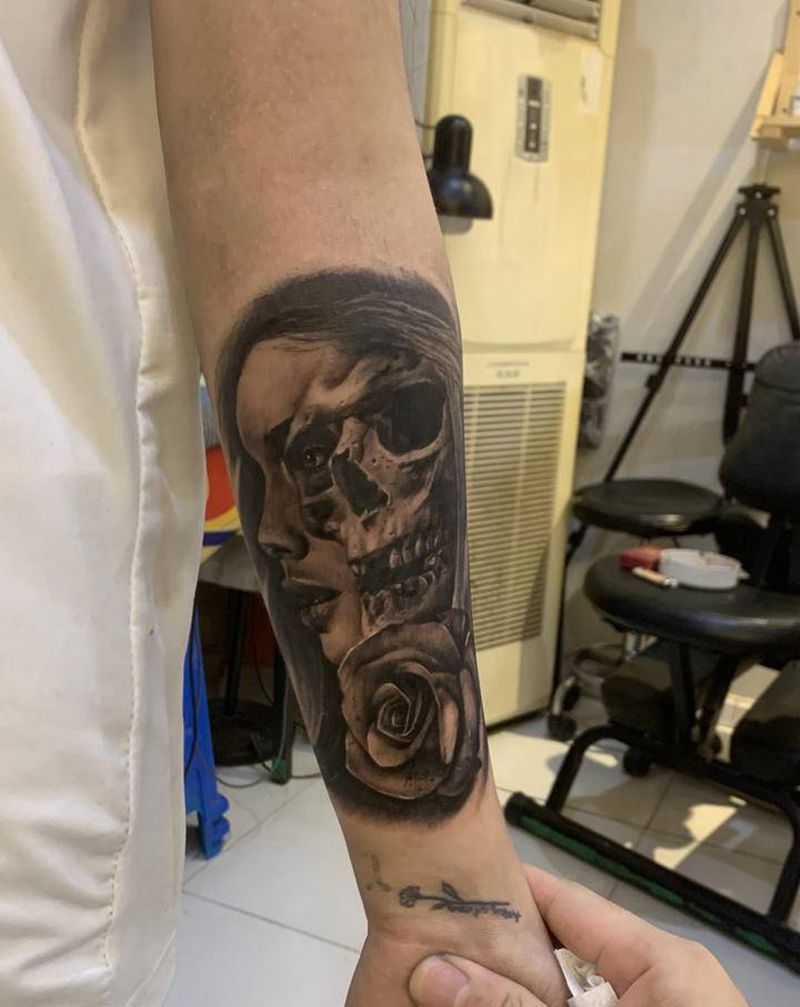 骷髅纹身图片_手部欧美写实纹身图案