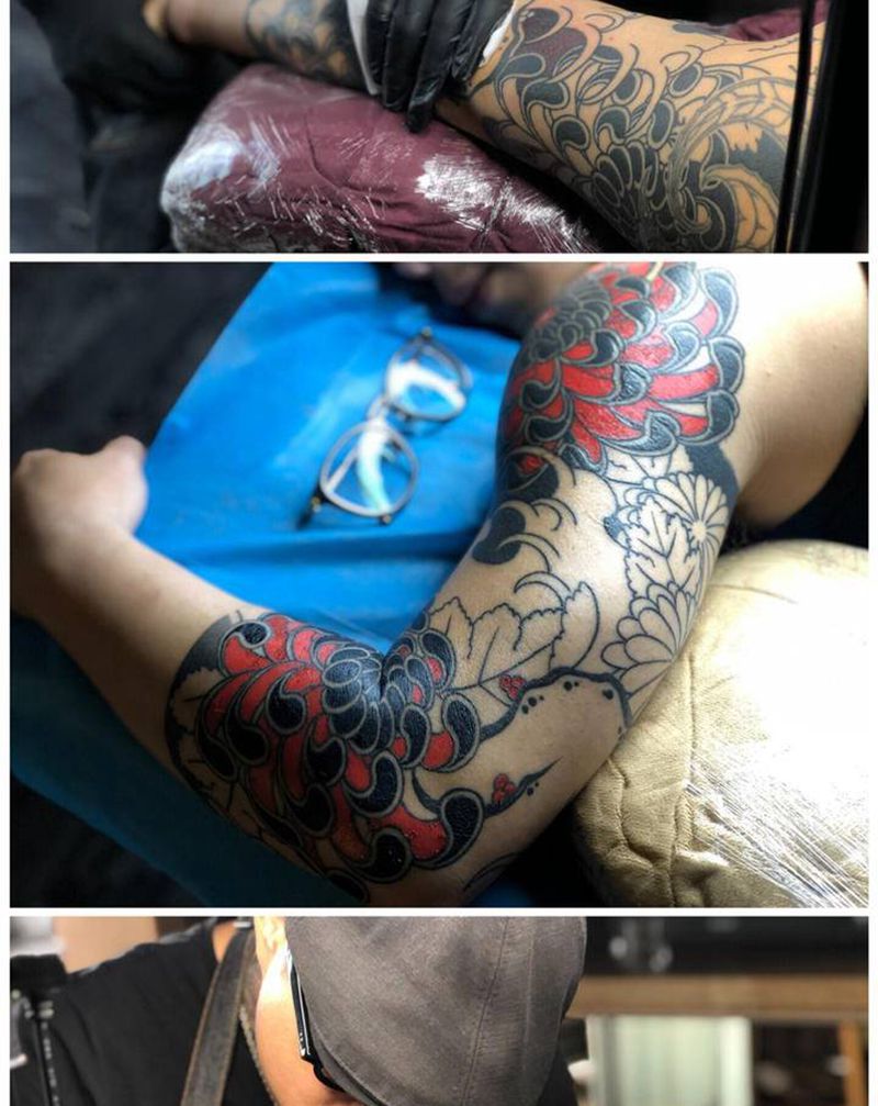 老传统菊花花臂纹身图片_手臂老传统菊花纹身图案