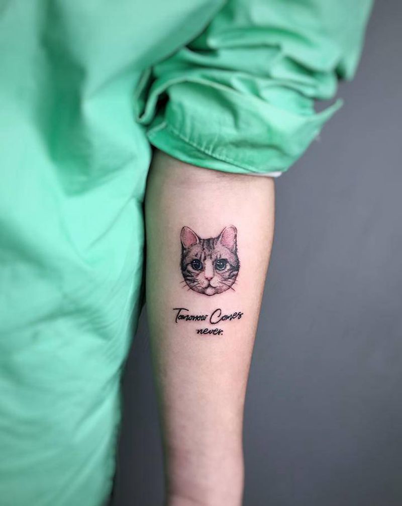 喵星人纹身图片_手臂纹身图案