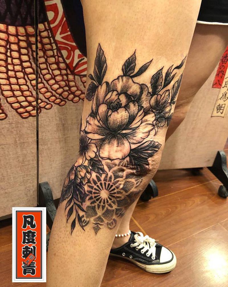烫伤遮盖纹身图片_腿部点刺素花遮盖纹身图案