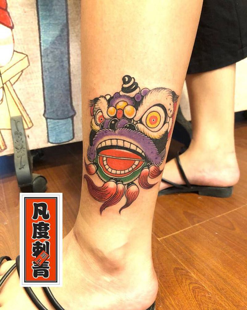 传统唐狮子纹身图片_腿部新传统唐狮子纹身图案