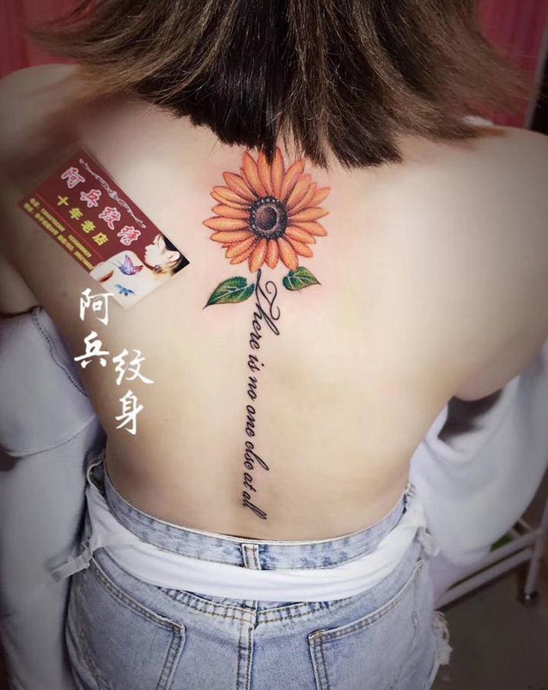 太阳花纹身图片_背部纹身图案