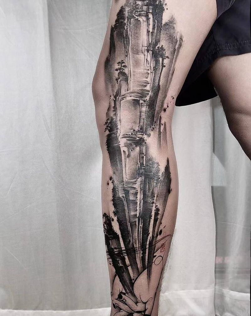 掌中乾坤纹身图片_腿部水墨纹身图案