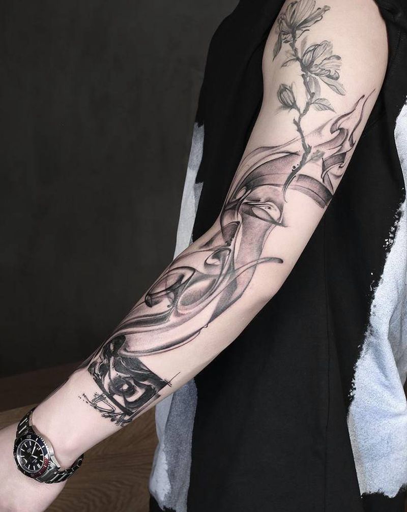 烟雾纹身图片_手臂水墨烟雾书法纹身图案