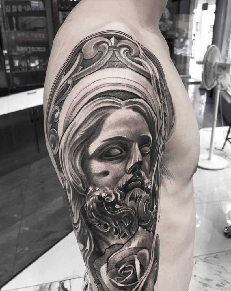 耶稣纹身图片_手臂欧美写实纹身图案
