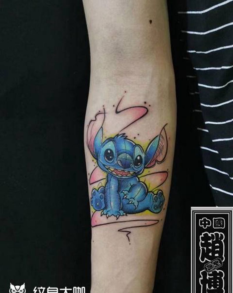 无牙仔纹身纹身图片_手臂水彩动漫纹身图案