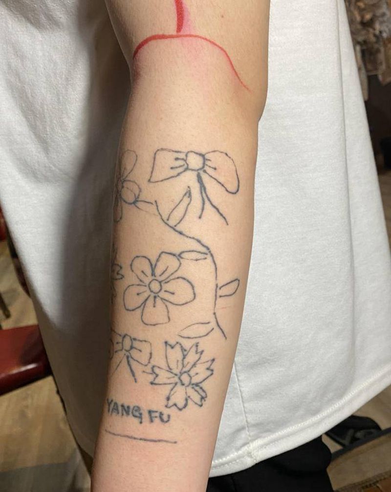 金鱼纹身图片_手臂纹身图案