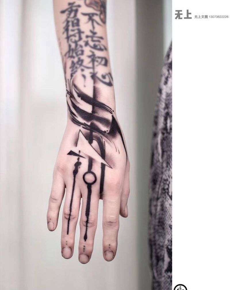 聿纹身图片_手部纹身图案