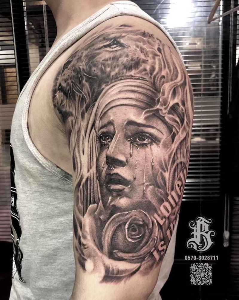 哭泣圣母纹身图片_手臂欧美写实纹身图案