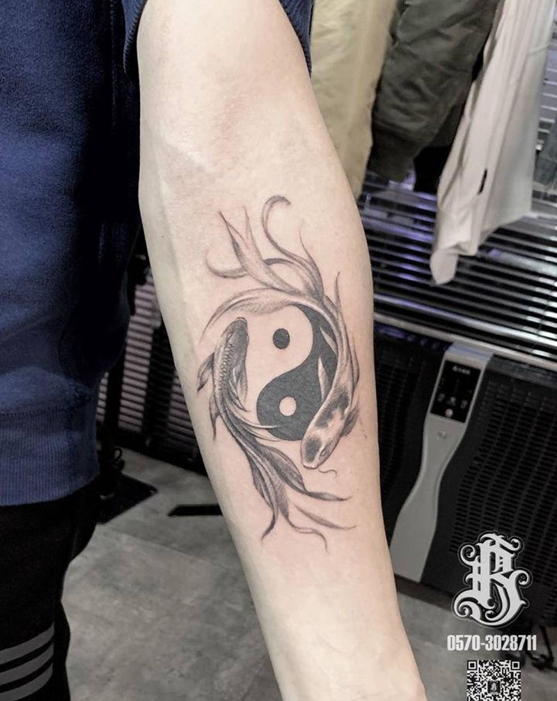阴阳鱼纹身图片_手臂欧美写实纹身图案