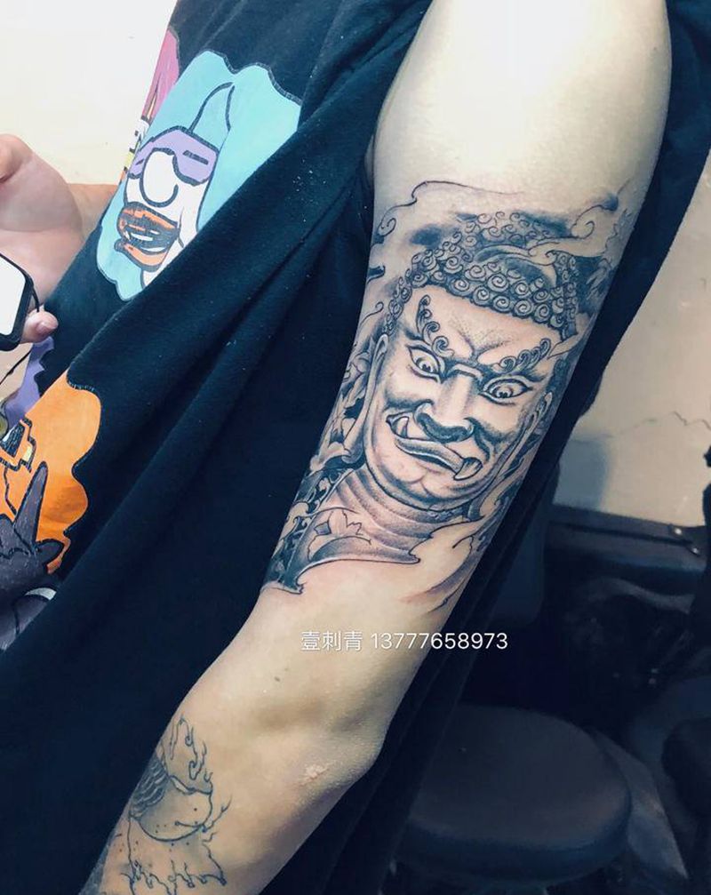 怒面如来纹身图片_手臂纹身图案