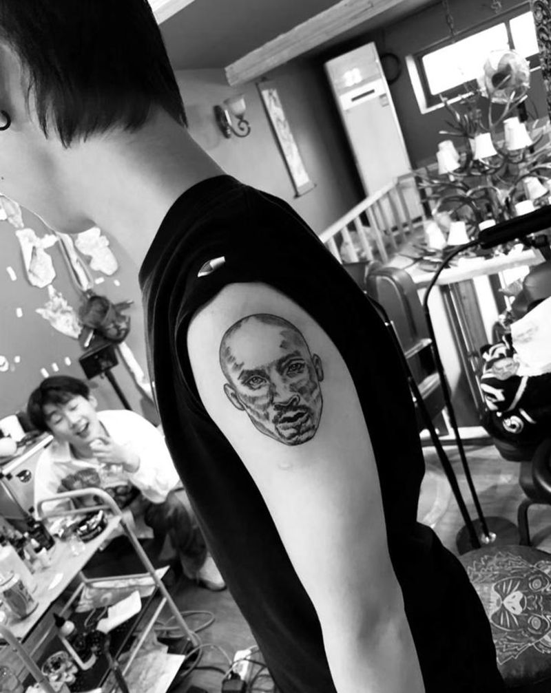 黑曼巴纹身图片_手臂纹身图案