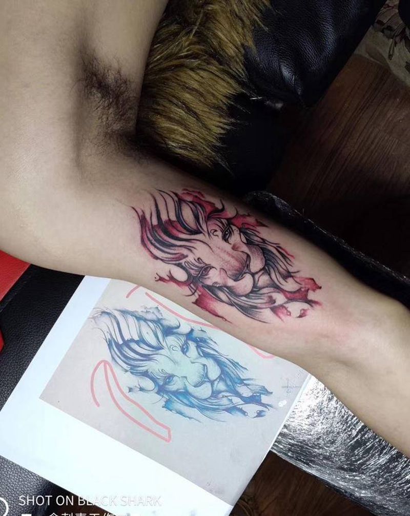 小狮子纹身图片_手臂纹身图案