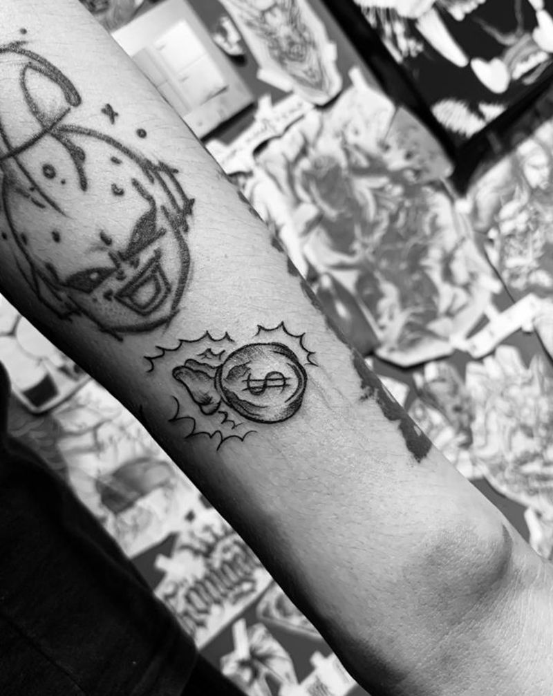 钱包纹身图片_手臂纹身图案