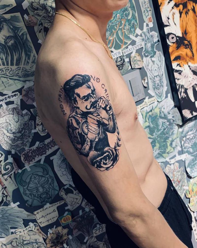 盖个疤纹身图片_手臂纹身图案